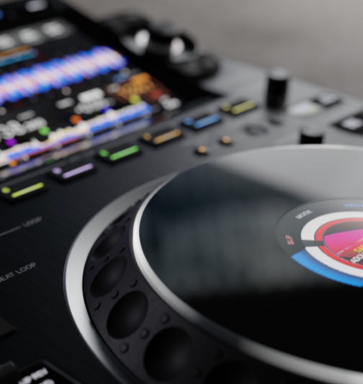 Close-up of a DJ media player and a spinning record